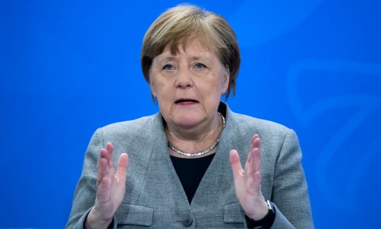 Thủ tướng Đức Angela Merkel phát biểu tại cuộc họp báo ở Berlin, hôm 15/4. Ảnh: AFP.